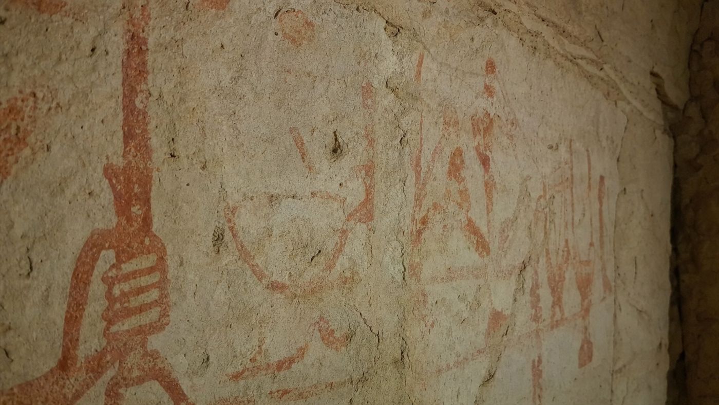 Red paint mark of a work crew on a stone block