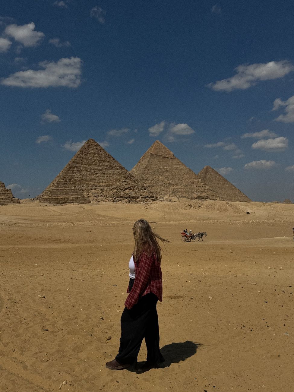 People for scale at the foot of a pyramid side