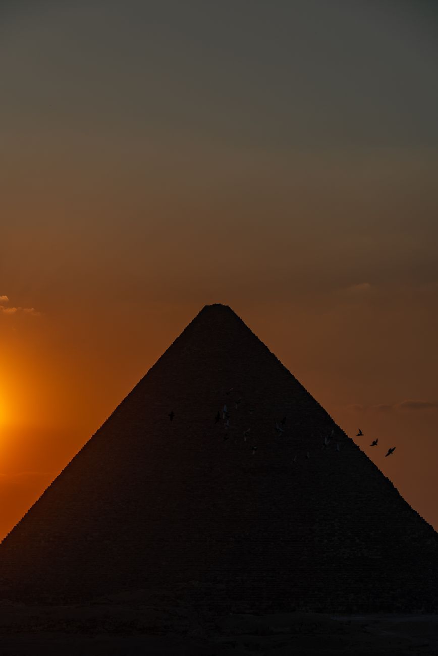 The three pyramids of Giza in the evening sun, seen from the southwest
