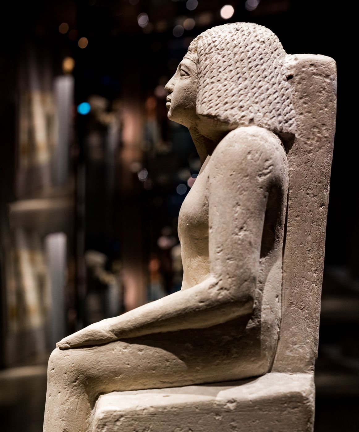 Seated statue of a high-ranking ancient Egyptian official, made of limestone