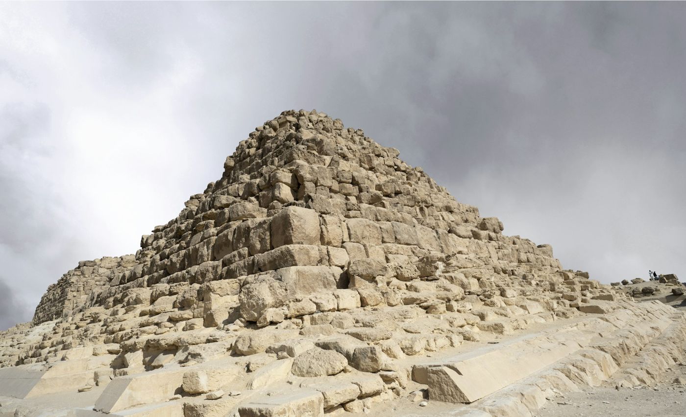 Weathered stone courses of the pyramid seen up close