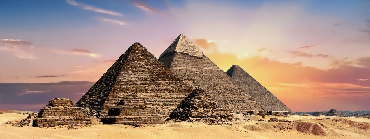 Steep flank of the Great Pyramid of Khufu up close with irregular stone layers