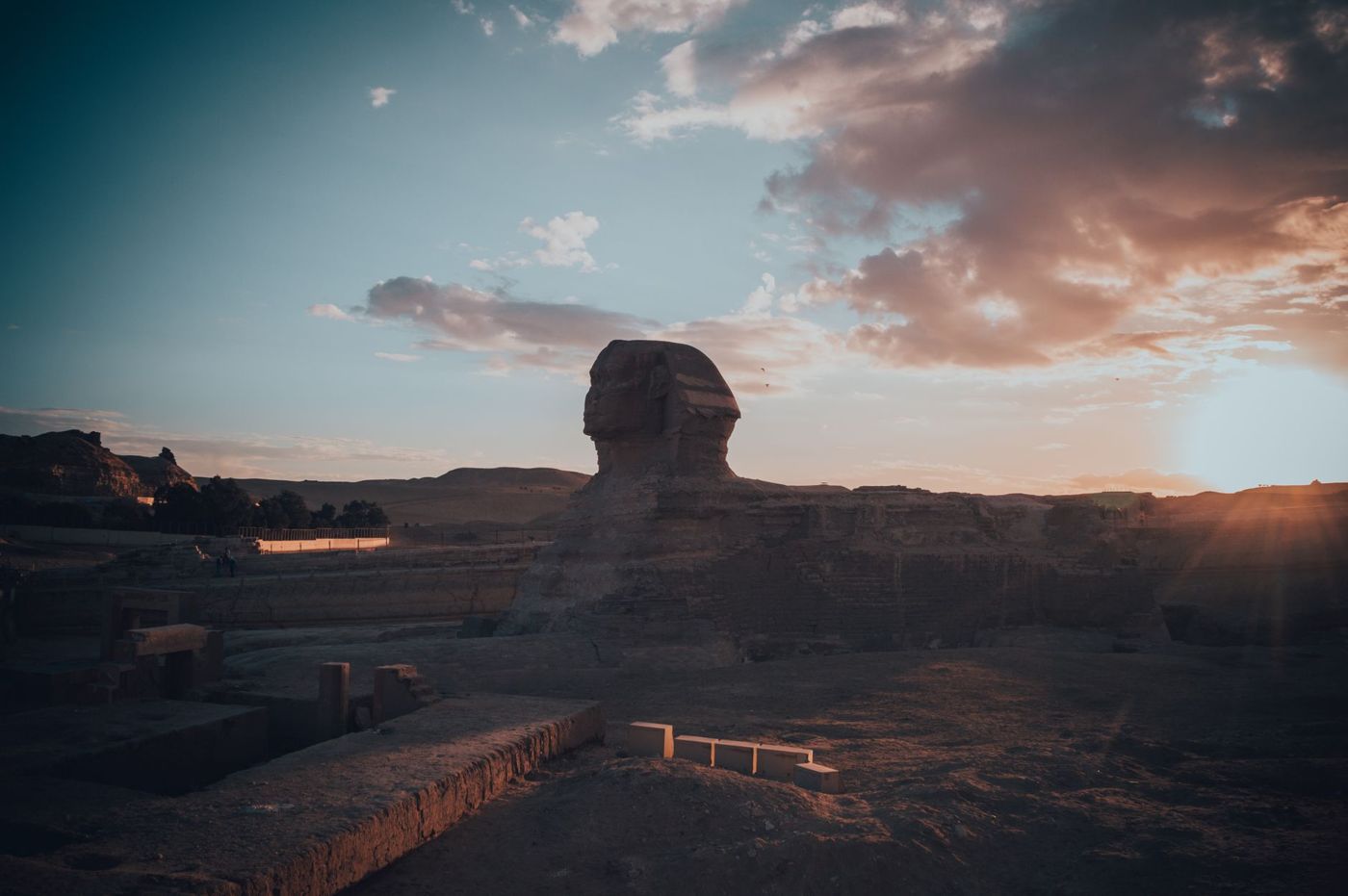 View of the Giza Plateau at dusk with illuminated structures