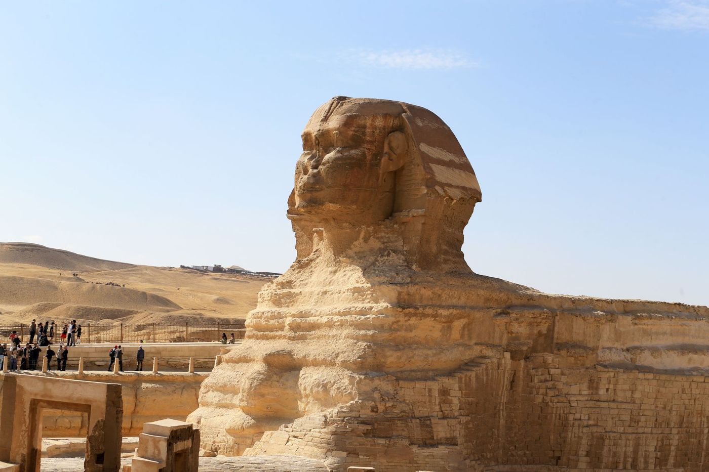 Outdoor audience stand with a view of the illuminated Sphinx